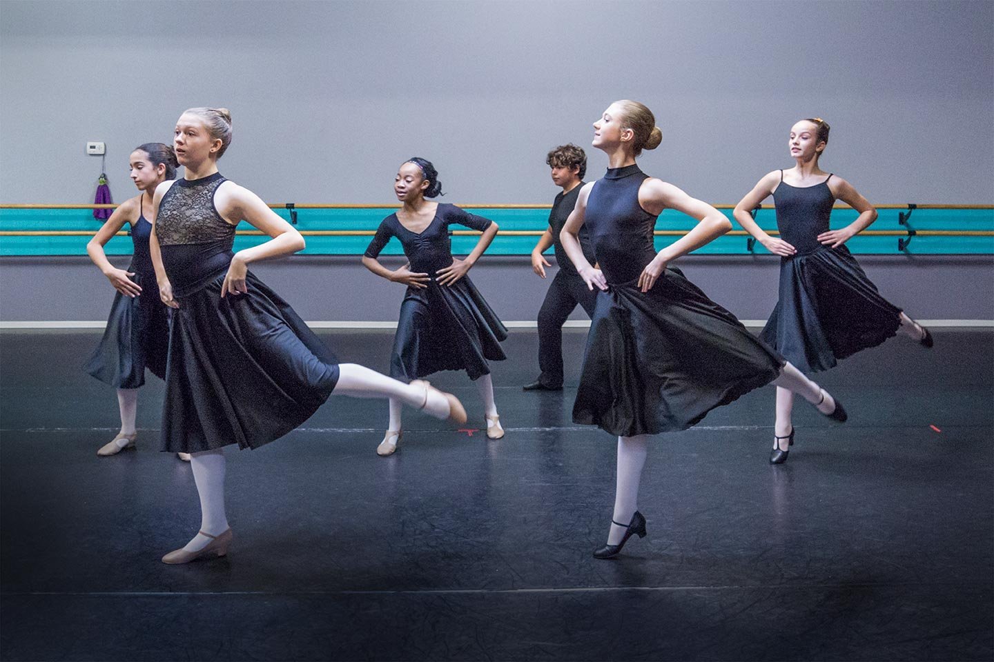 Plainfield Dance Academy students in character class at the studio barre
