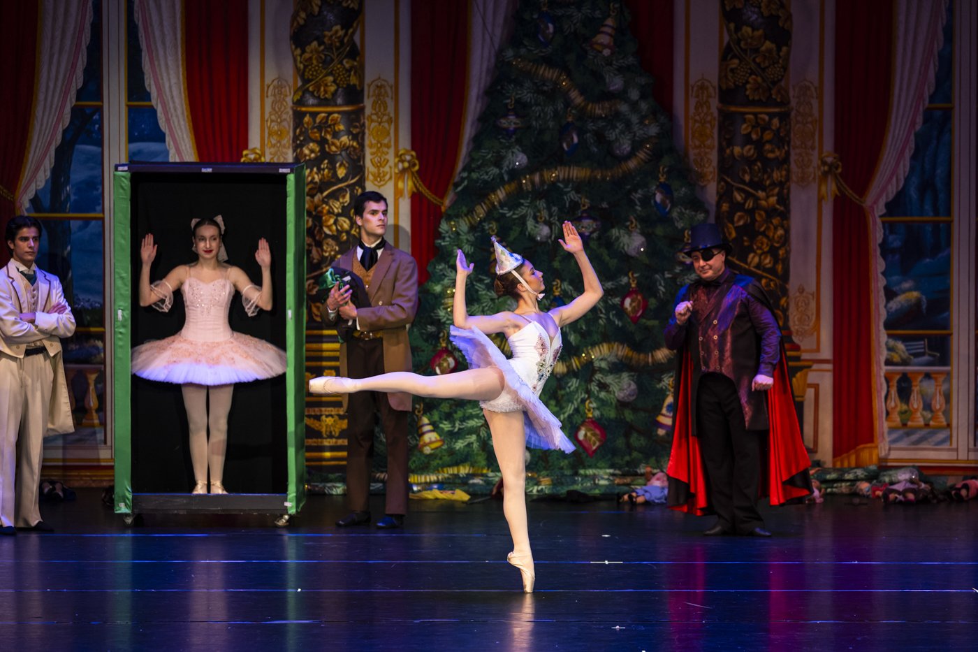 Dancers in costume in a stage scene